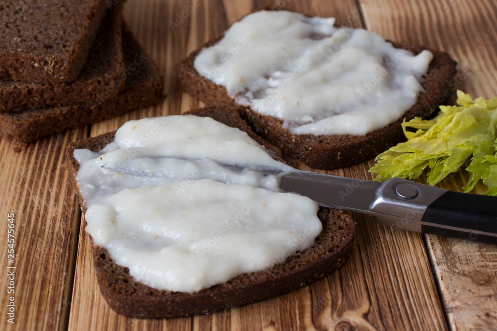 sandwiches with horseradish on a wooden table sandwiches with horseradish on a wooden table