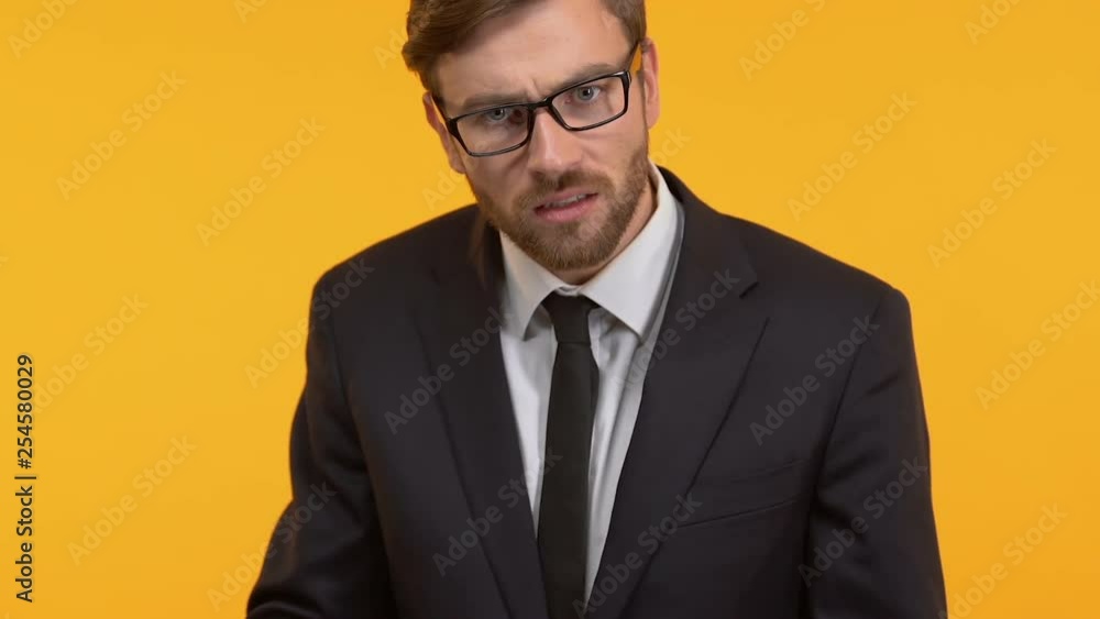 Annoyed man screaming into megaphone, trying to convey his opinion to others