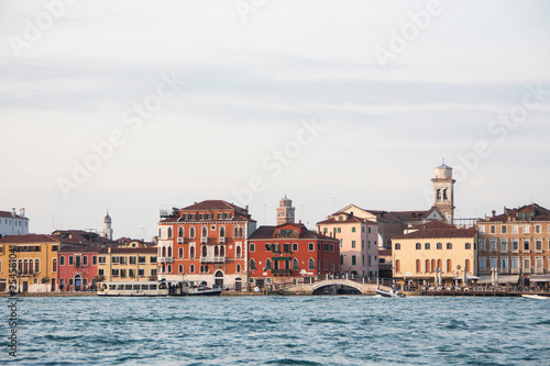 Venetian embankments, the unique architecture of the city on the water, bright medieval houses