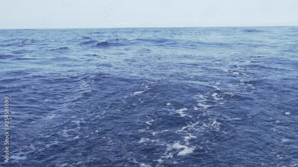 wake of a sailboat while sailing wake of a sailboat while sailing