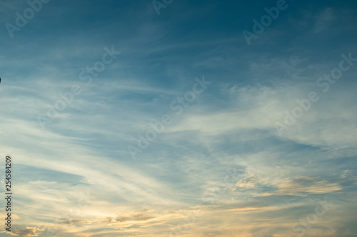 sunlight through cloud on dramatic sunset sky