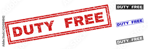 Grunge DUTY FREE rectangle stamp seals isolated on a white background. Rectangular seals with grunge texture in red, blue, black and grey colors.