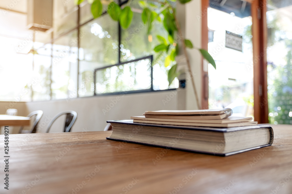 Books and notebooks on wooden table Books and notebooks on wooden table