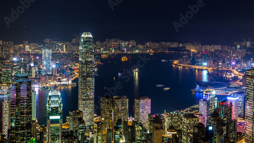 Hong Kong city view from The Peak at night, Victoria Harbor view from Victoria Peak at night, Hong Kong. © Kalyakan
