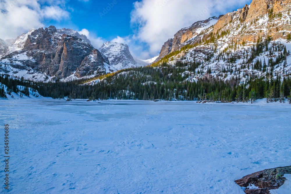 Fototapeta premium Snowshoeing to Loch Lake in Rocky Mountain National Park in Estes Park, Colorado