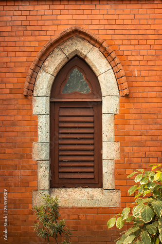 window in brick wall