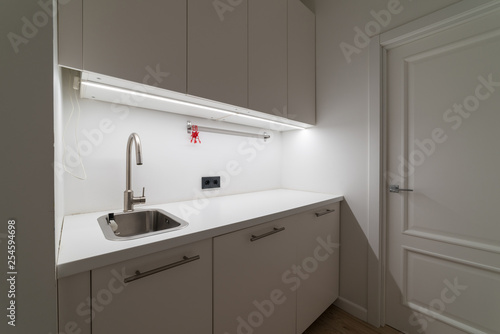 Laundry room with sink