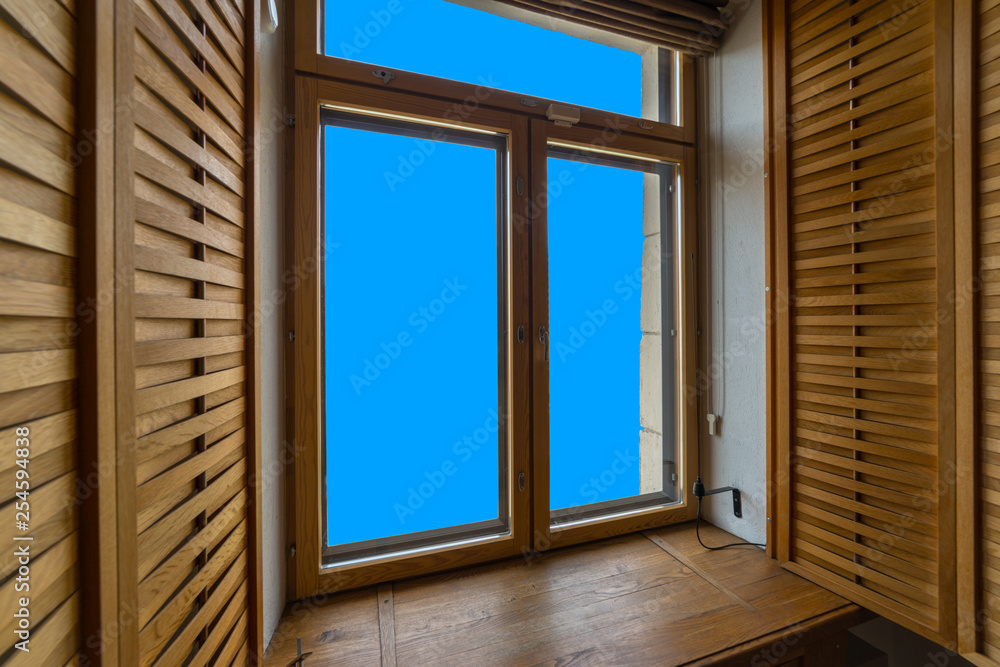 Window with open shutters. The view from the inside. Blue mask. Window with open shutters. The view from the inside. Blue mask.
