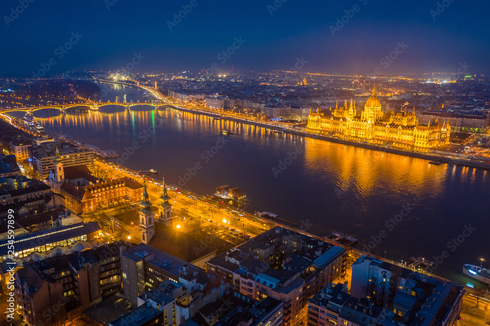Budapest, Hungary - Aerial skyline view of Budapest at blue hour with illuminated Parliament, Margaret Bridge and River Danube