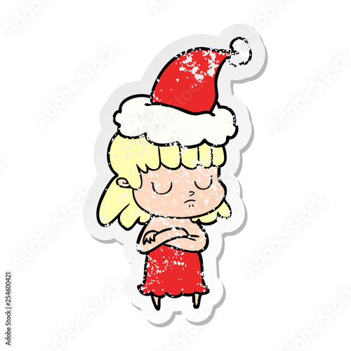 distressed sticker cartoon of a indifferent woman wearing santa hat