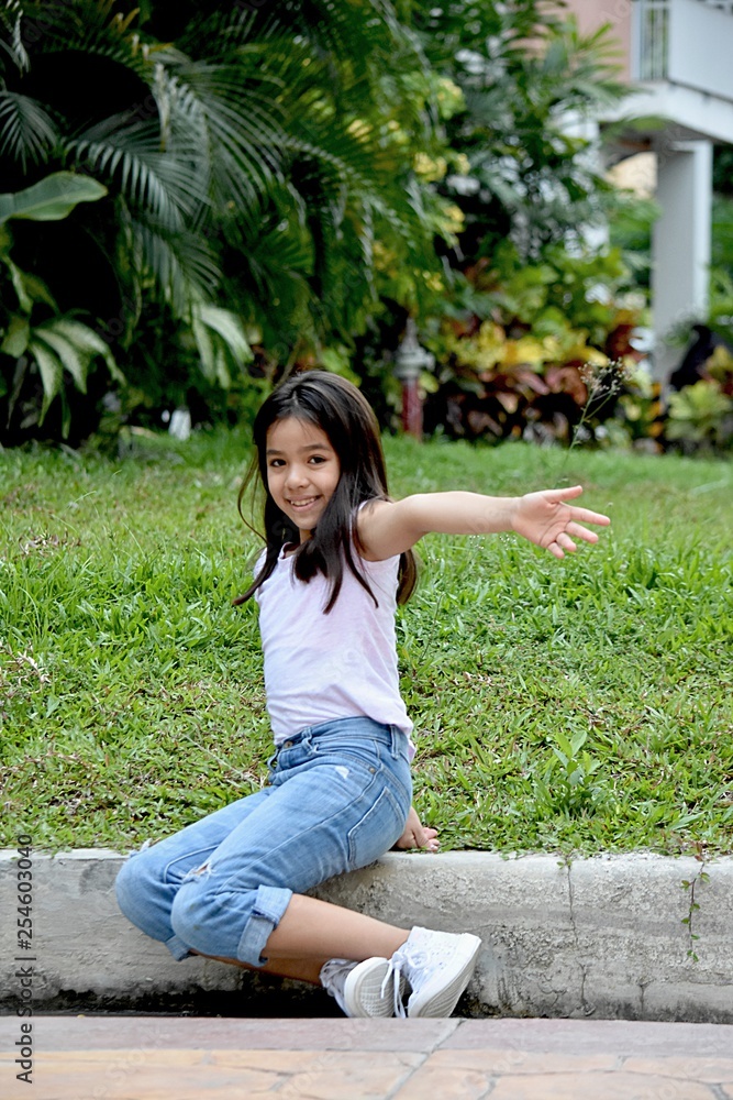 Naklejka premium Young Filipina Girl And Freedom