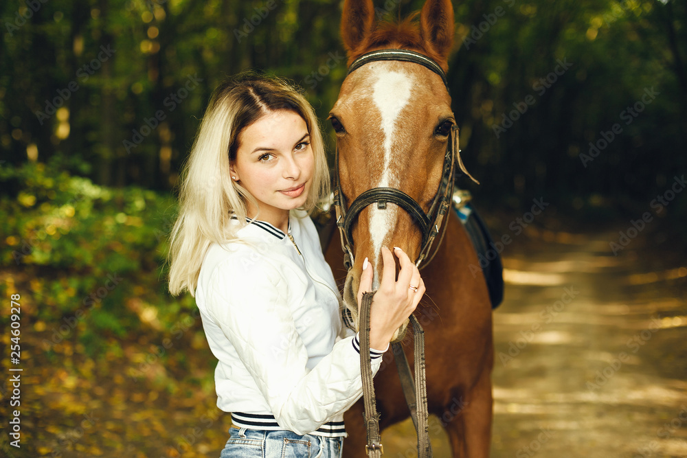 Obraz premium woman with horses