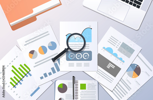 analysis financial results finance business chart graph diagram statistic concept top angle view desktop laptop paper documents report office stuff horizontal