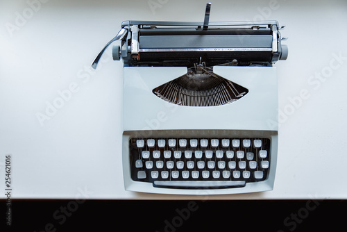 old typewriter on black background