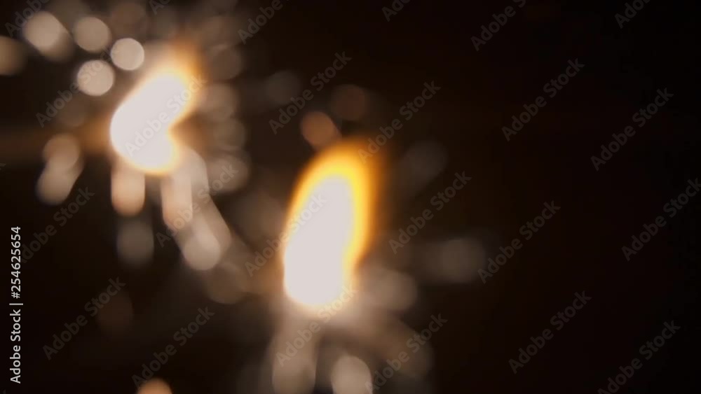 Sparklers burn at night, bright light. Sparklers burn at night, bright light.
