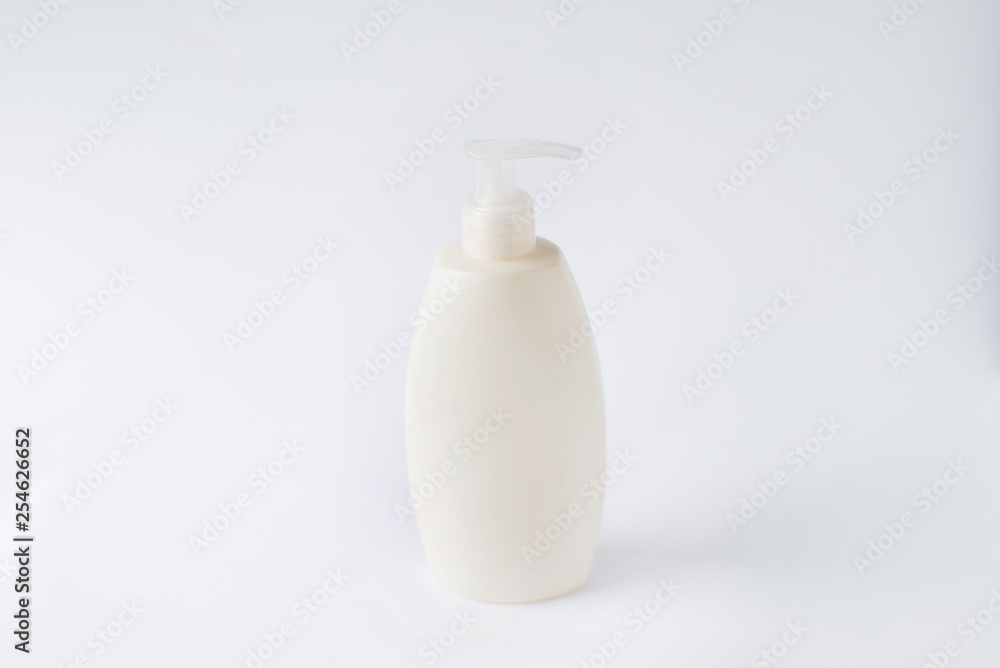 White plastic bottle with spray isolated on white background.bath bottle White plastic bottle with spray isolated on white background.bath bottle