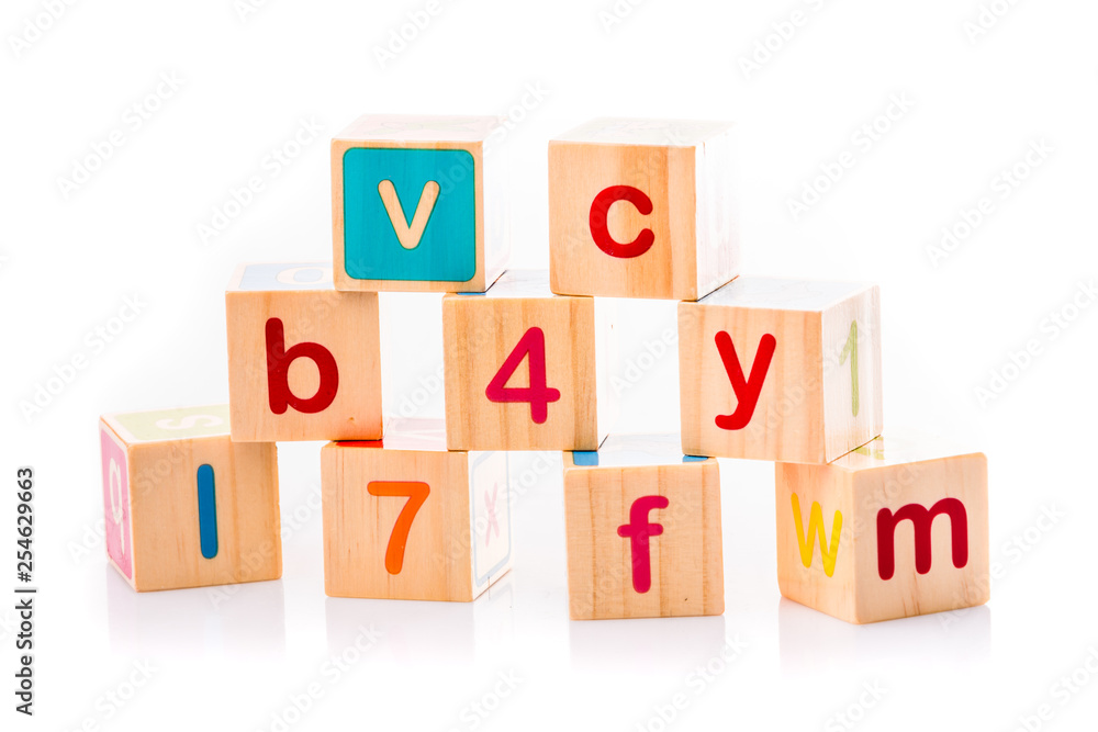Toy cubes. Baby collection. ABC letters made from baby toys Toy cubes. Baby collection. ABC letters made from baby toys
