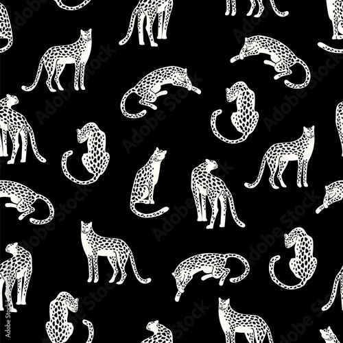 Seamless exotic pattern with abstract silhouettes of leopards.
