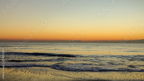 A sunrise next to the shore of the mediterranean sea