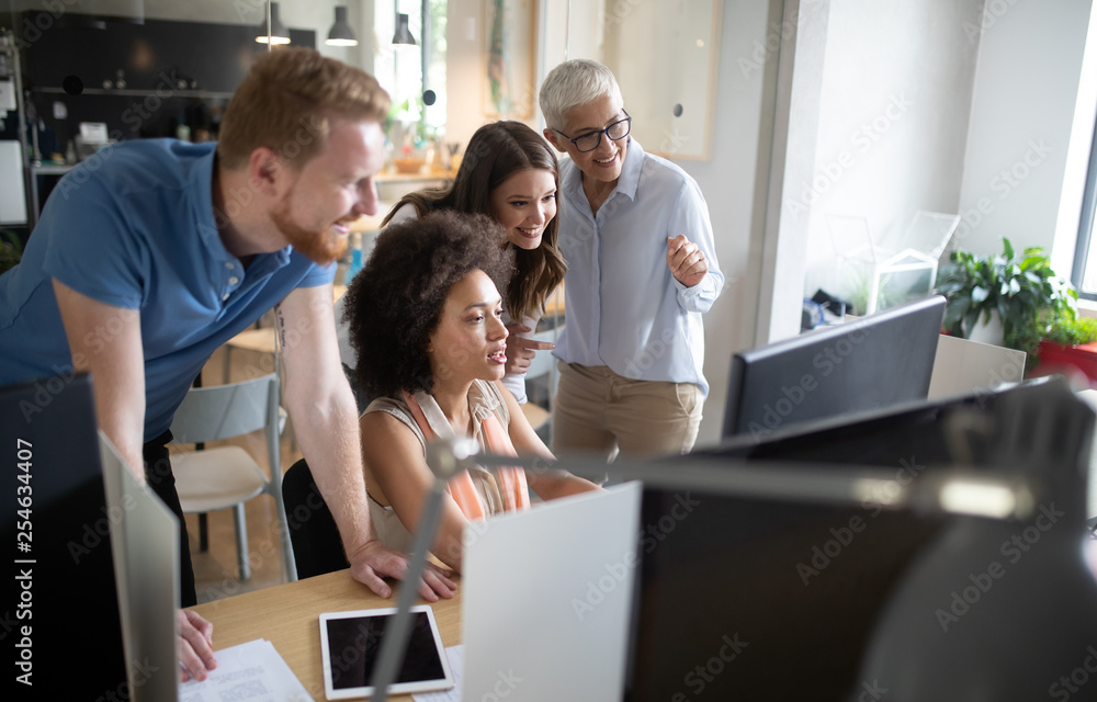 Successful group of business people at work in office Successful group of business people at work in office