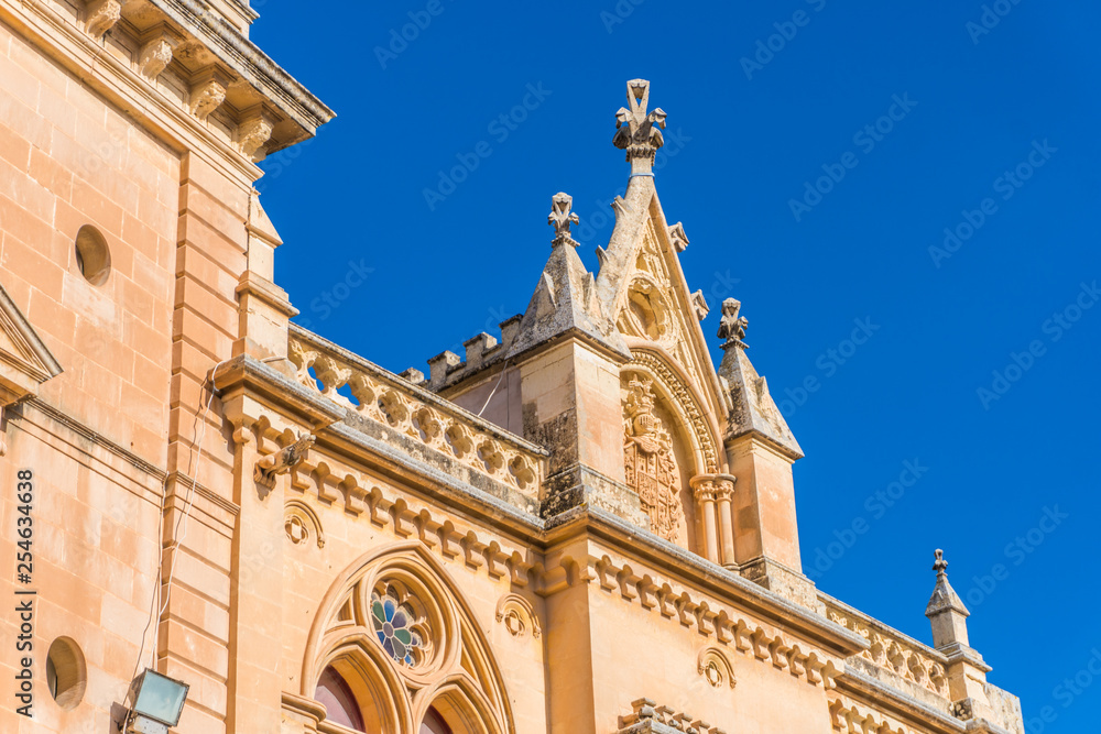 View of old Mdina street and buildings with a traditional Maltese style View of old Mdina street and buildings with a traditional Maltese style