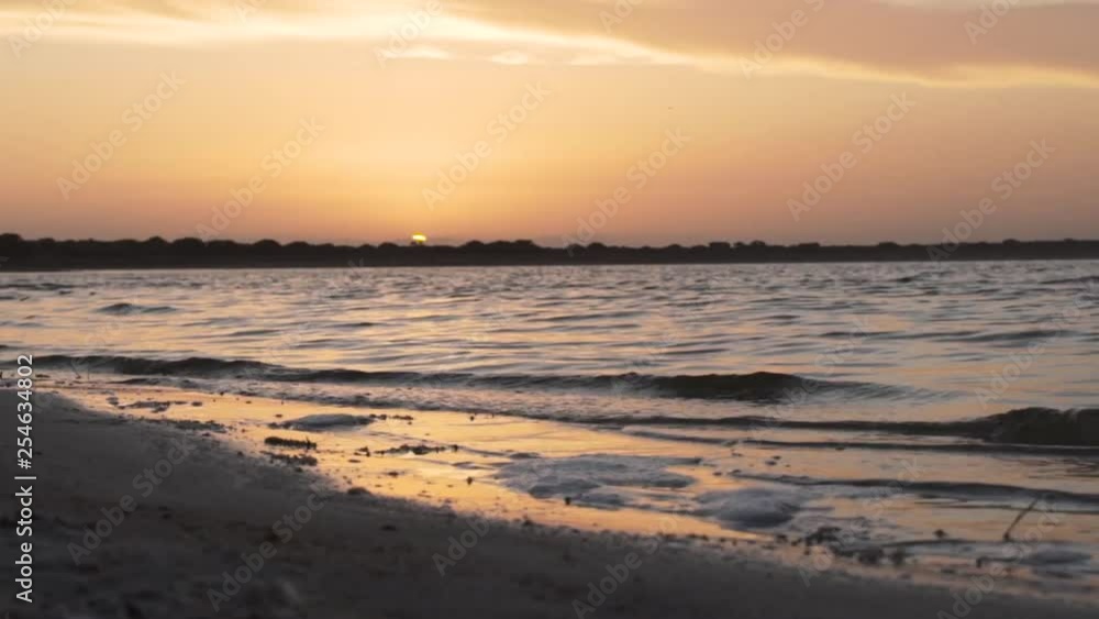 Time-lapse of sunset over lake Time-lapse of sunset over lake