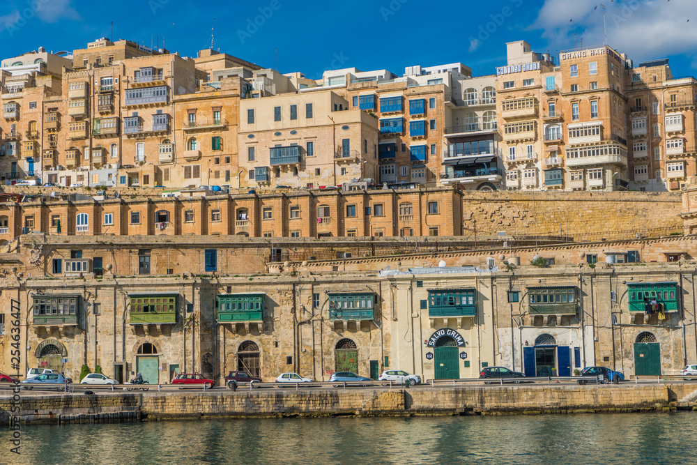 View on Valletta with its architecture from the sea on the boat
