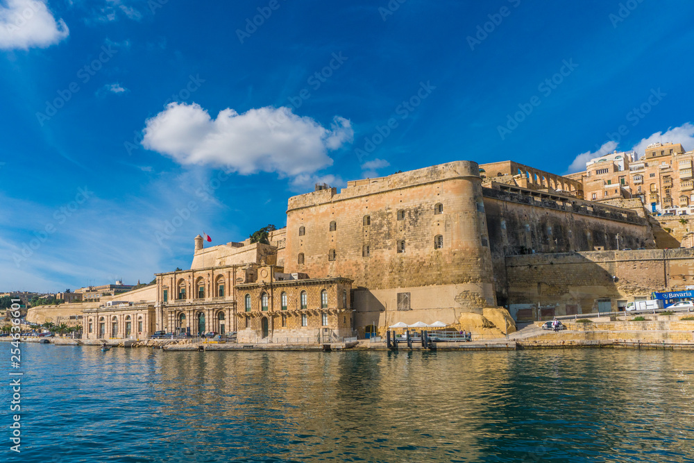View on Valletta with its architecture from the sea on the boat