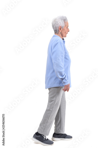 senior woman with sportsweare on white background