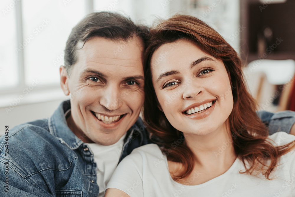 Close up of happy man and woman embracing Close up of happy man and woman embracing