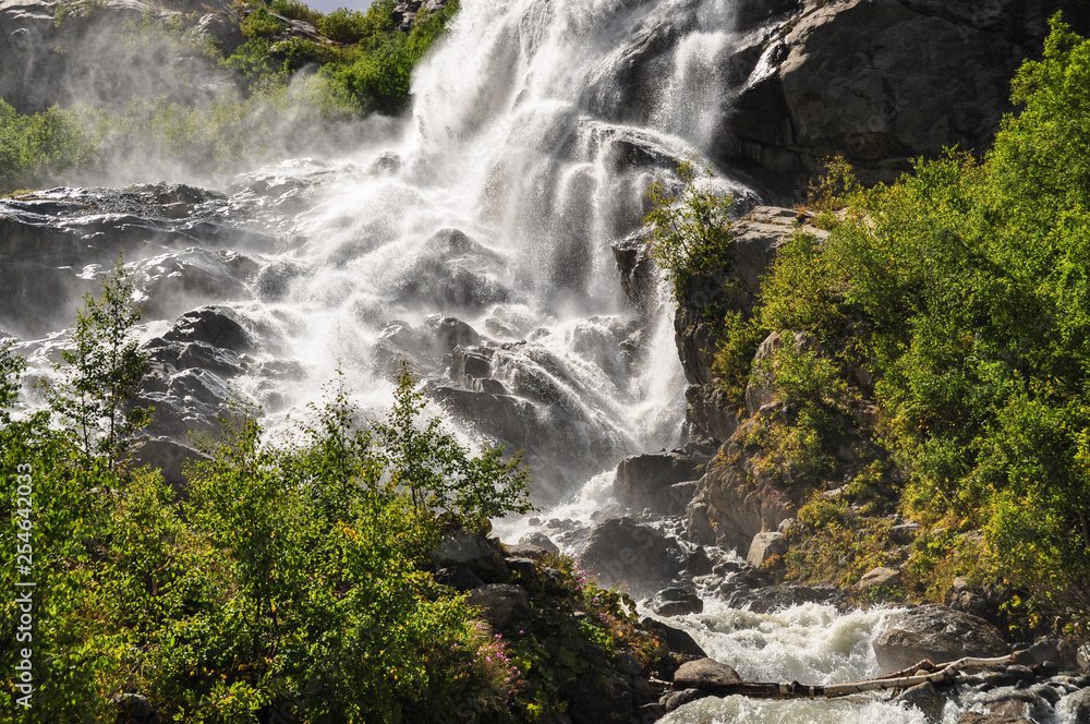 Waterfall scenes in mountains, national park Dombai, Caucasus, Russia, Europe Waterfall scenes in mountains, national park Dombai, Caucasus, Russia, Europe