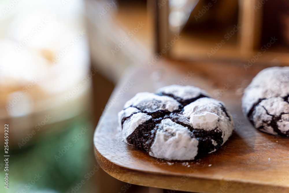 Chocolate Crinkle Cookies in powdered sugar, Cracked chocolate biscuits. Chocolate biscuits. Christmas cookies.. Chocolate Crinkle Cookies in powdered sugar, Cracked chocolate biscuits. Chocolate biscuits. Christmas cookies..