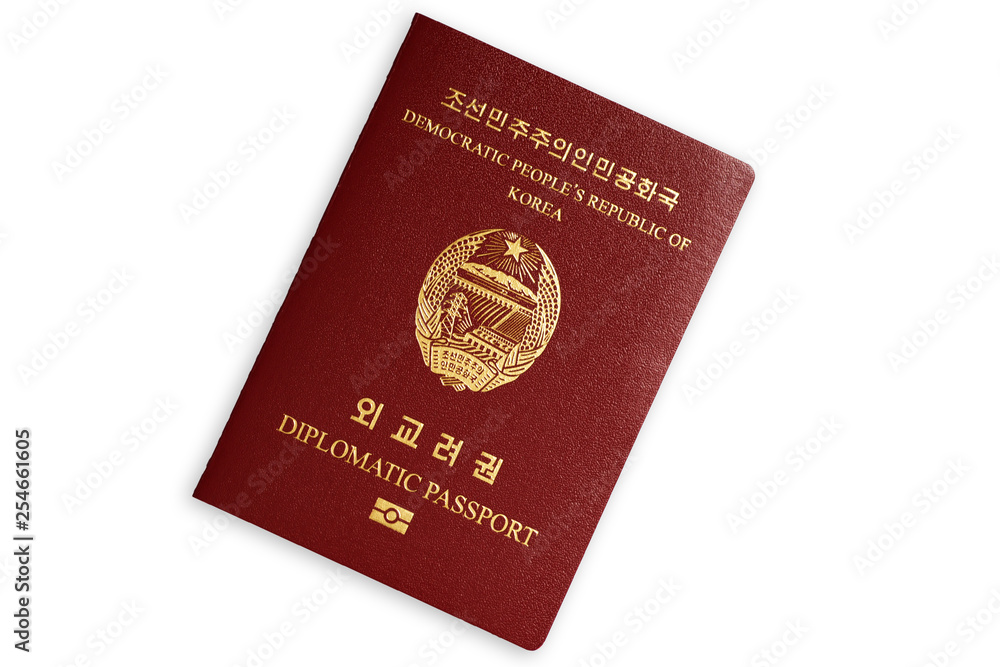 North Korea's red diplomatic passport isolated on white background North Korea's red diplomatic passport isolated on white background
