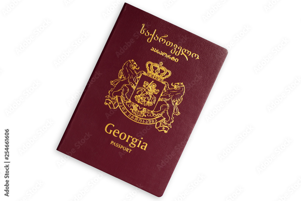 Red passport of the Republic of Georgia isolated on white background Red passport of the Republic of Georgia isolated on white background