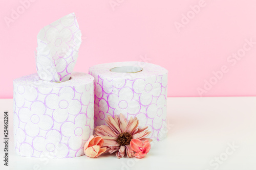 toilet paper rolls with natural flowers close up