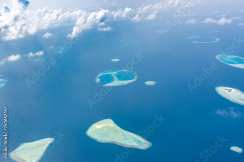 Aerial view of Maldives atolls is the world top beauty. Maldives tourism. Exotic aerial landscape in Maldives islands