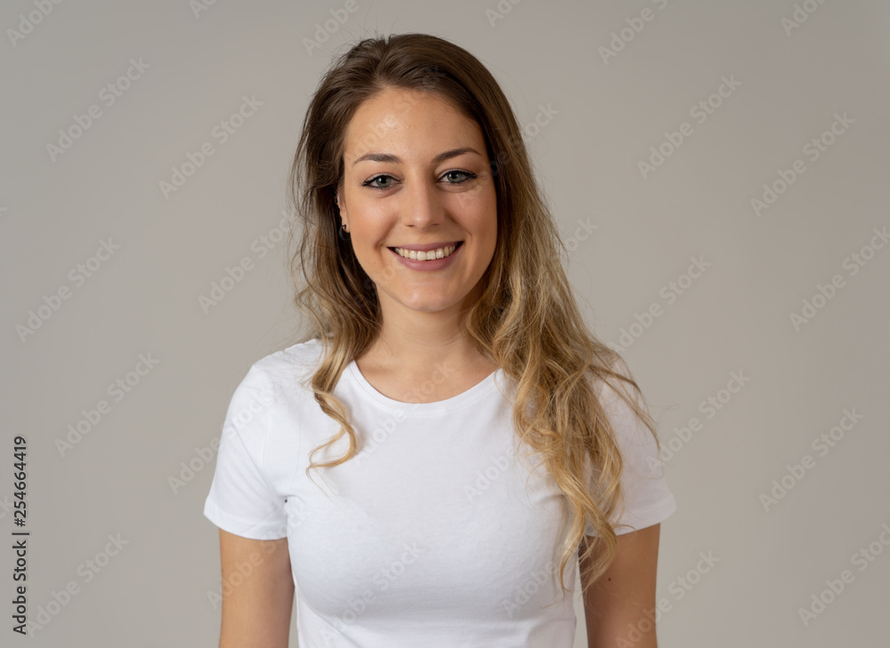 Human expressions and emotions. Close up of young attractive cheerful woman with smiling happy face Human expressions and emotions. Close up of young attractive cheerful woman with smiling happy face