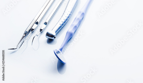 Closeup of dental instrumets on white table