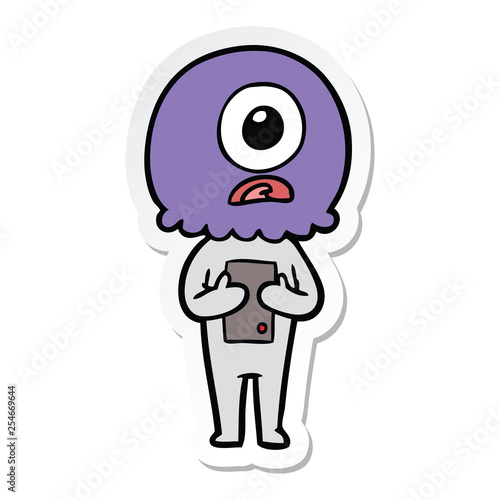 sticker of a cartoon cyclops alien spaceman