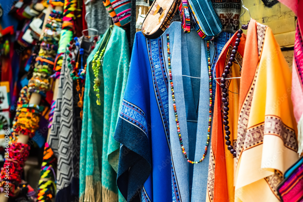 Hanging colorful dresses with weaves and necklace
