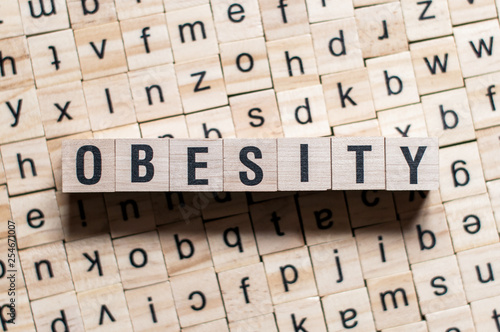 the word of OBESITY on building blocks concept