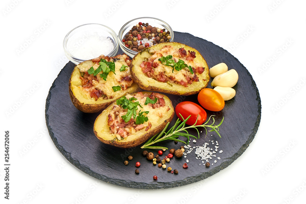 Stuffed baked potatoes with bacon and cheese, close-up, isolated on white background