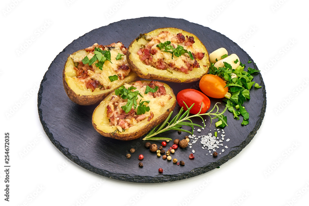 Delicious stuffed potatoes with cheese and bacon, close-up, isolated on white background Delicious stuffed potatoes with cheese and bacon, close-up, isolated on white background