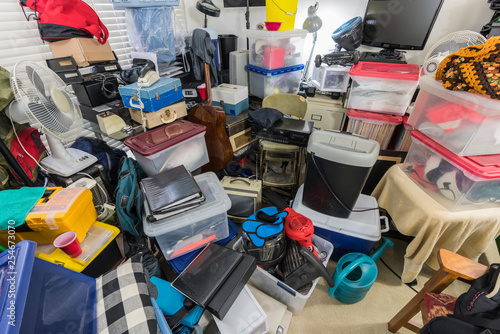 Photos Hoarder room packed with storage boxes, old electronics, files, business equipment and household items