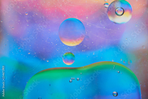 abstract background of stains and paint bubbles in liquid