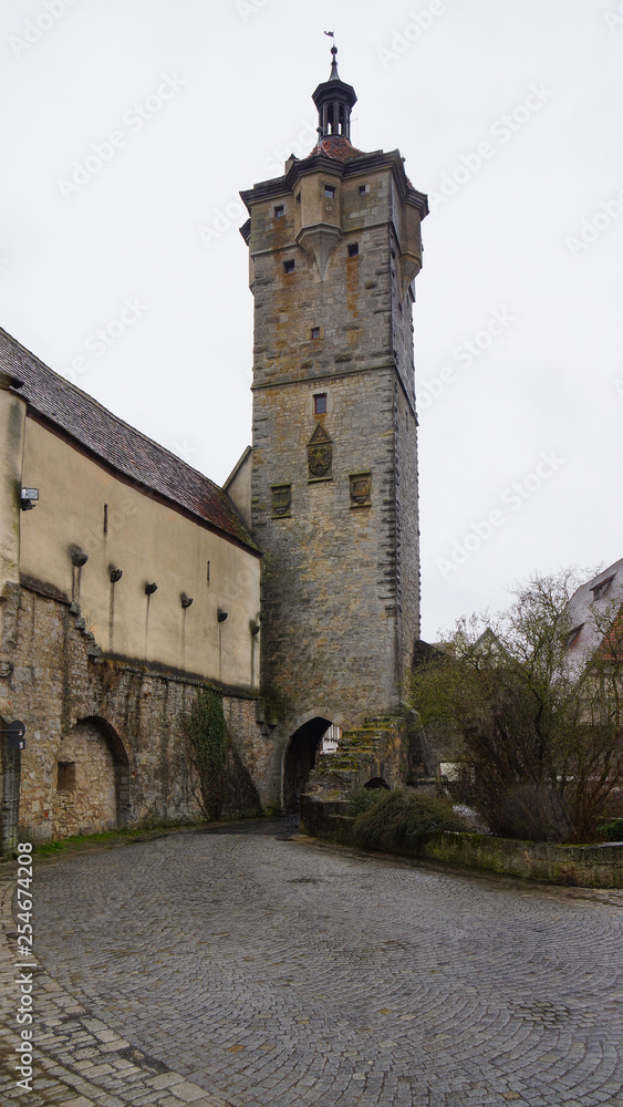 rothenburg tower with gate in front of town wall