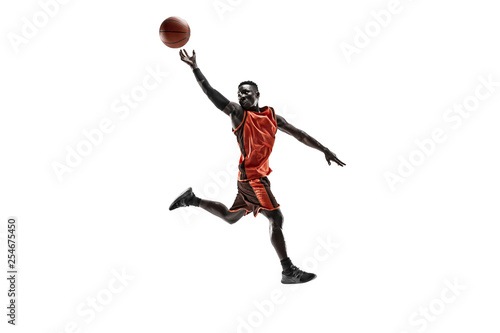 Full length portrait of a basketball player with a ball isolated on white studio background. advertising concept. Fit african anerican athlete with ball. Motion, activity, movement concepts.
