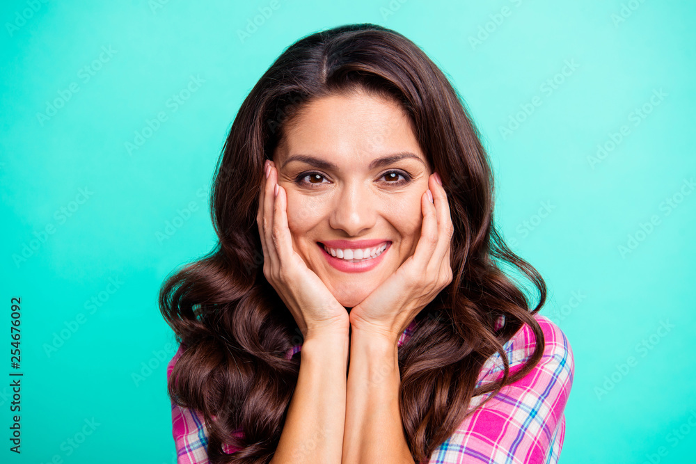 Close up photo amazing she her wavy lady arms hands hold cheeks head sweet gentle overjoyed wearing casual plaid checkered pink shirt outfit isolated teal green bright vivid vibrant background Close up photo amazing she her wavy lady arms hands hold cheeks head sweet gentle overjoyed wearing casual plaid checkered pink shirt outfit isolated teal green bright vivid vibrant background