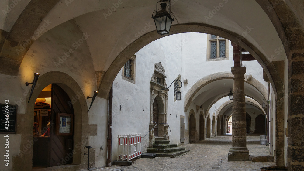 arch gates of old rothenburg houses in historic center