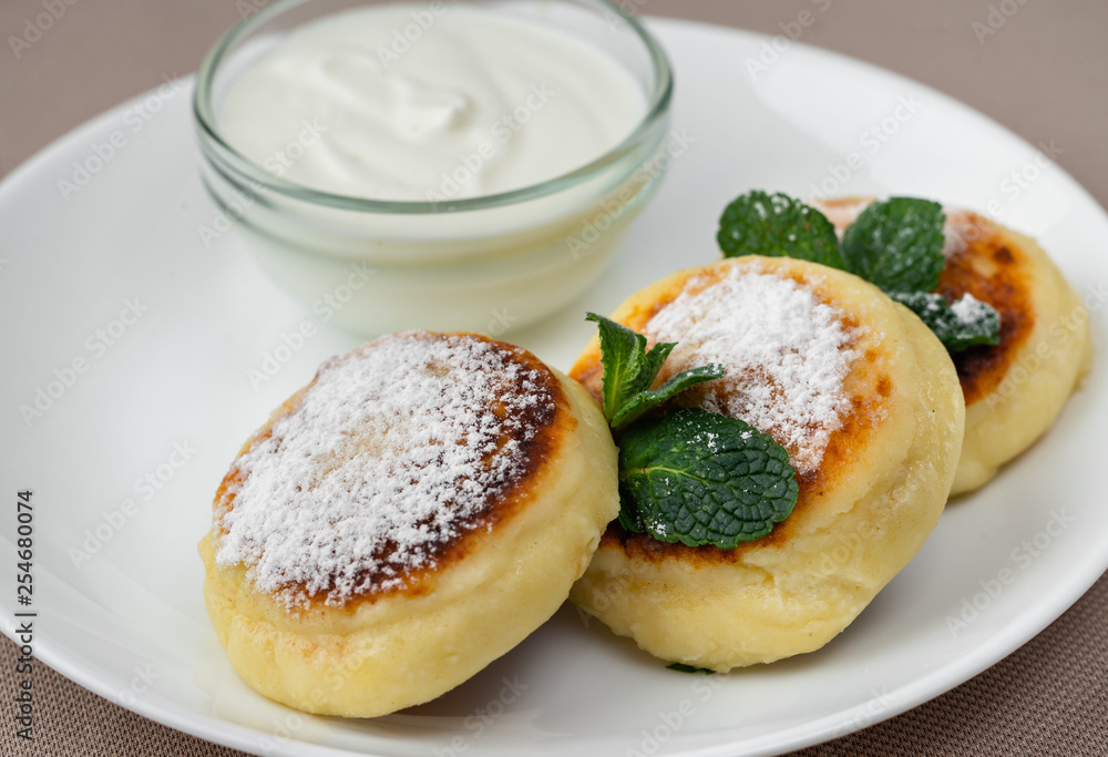 pancakes with powdered sugar and sour cream pancakes with powdered sugar and sour cream
